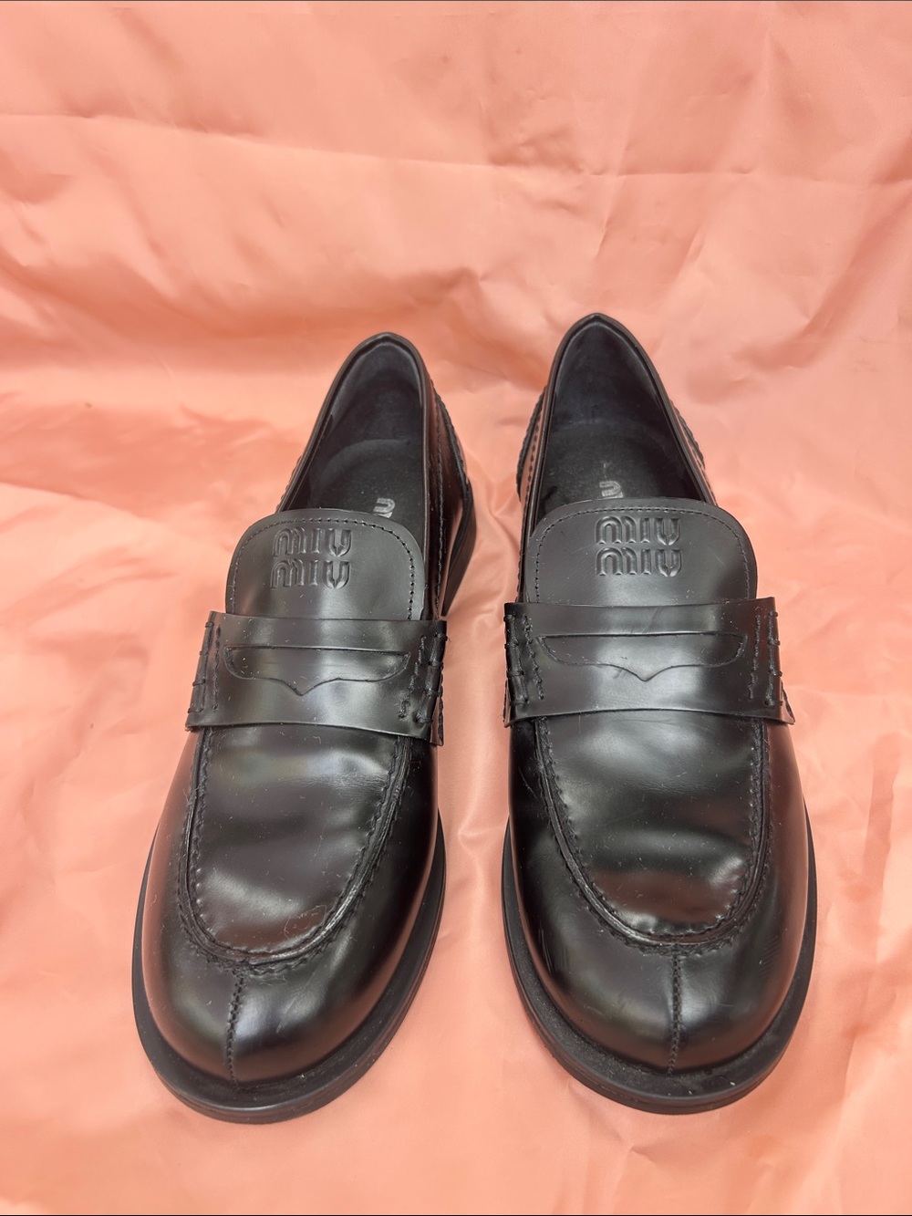 Miu Miu Black Leather Penny Loafers with Logo Tongue